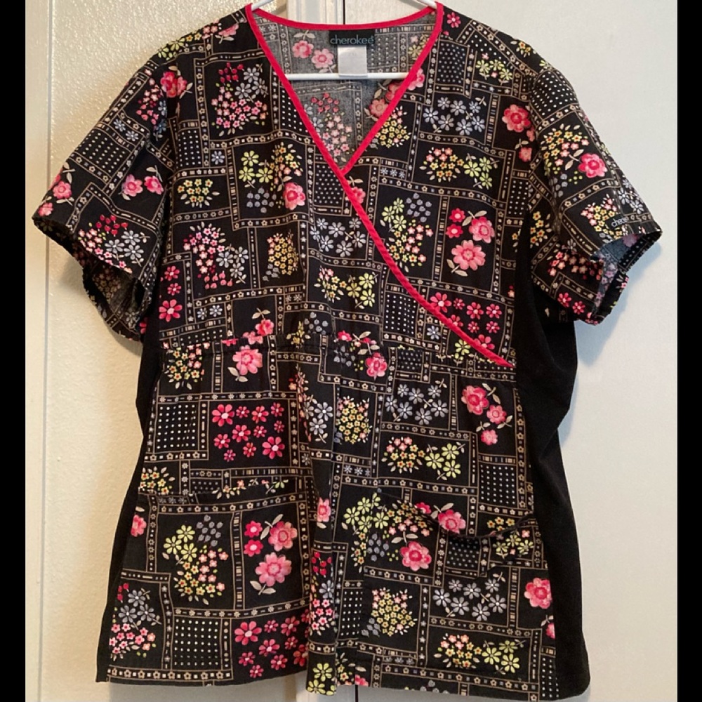 This Cherokee brand Size 2XL blouse sports colorful florals on black background.